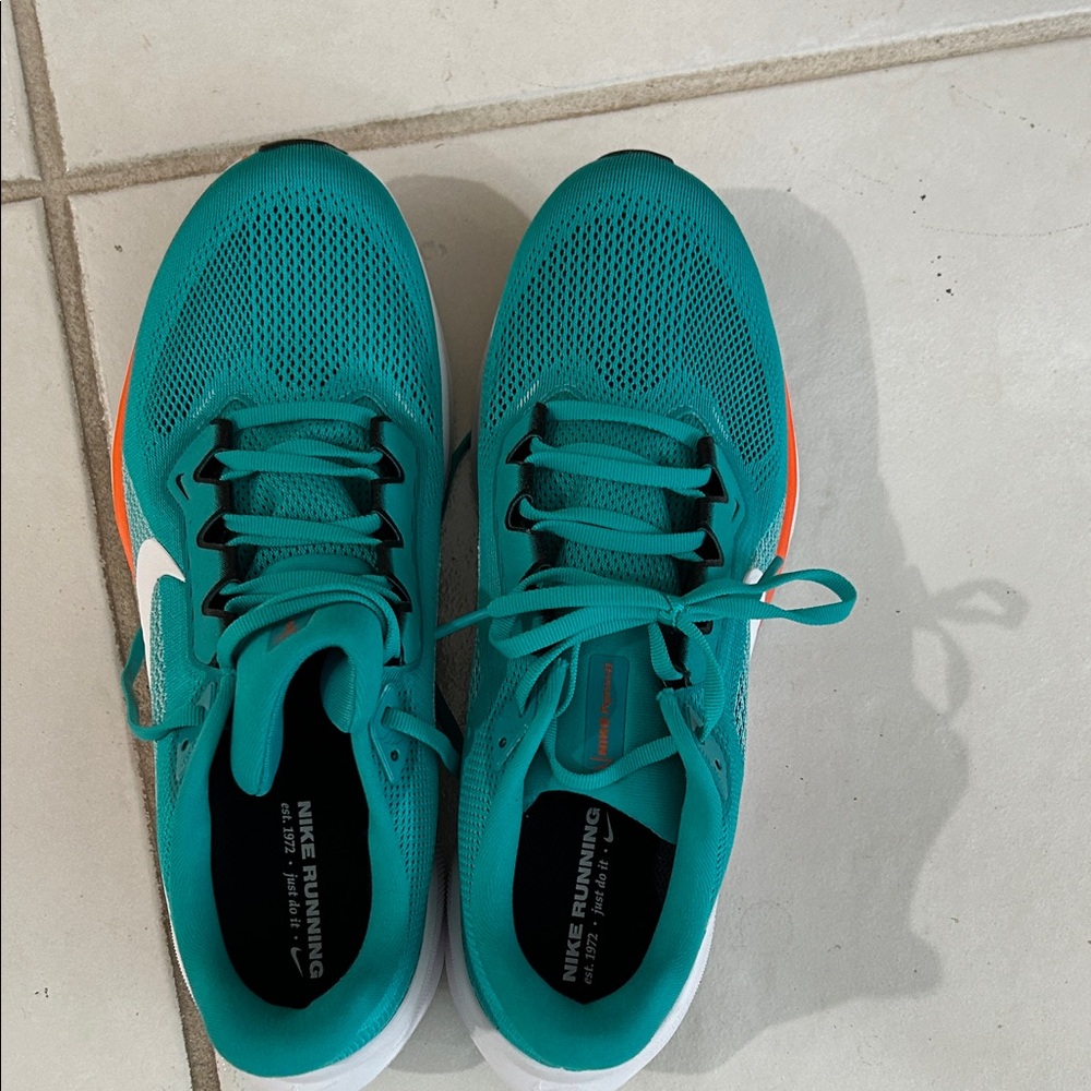 Nike Turquoise Sneakers with Orange Highlights
